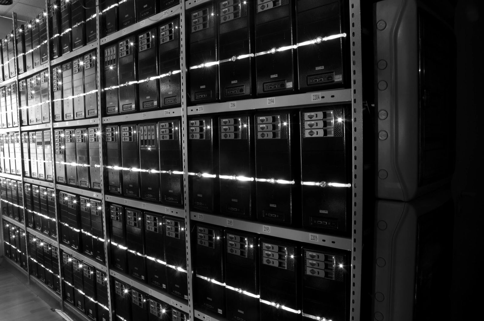 Rows of server racks in a data center